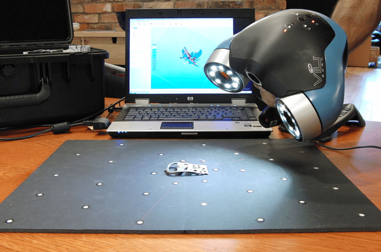 3D laser scanner scanning an object