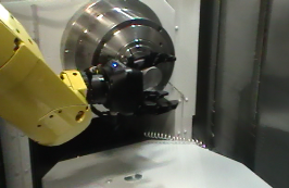 Robotiq 3F gripper loading a CNC lathe