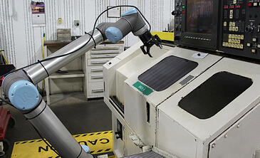 Machine tending application a Robotiq 2F-85 gripper