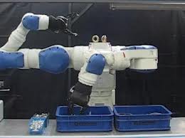dual arm motoman with electric robotic hand