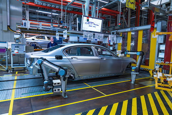 Car manufacturing with robots