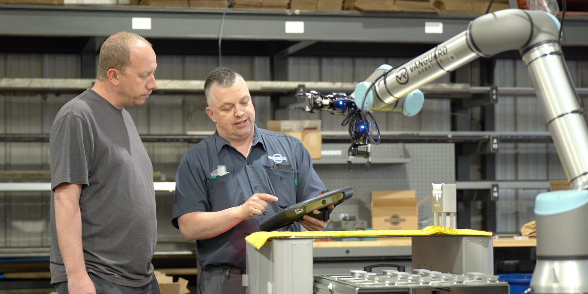 Machinists programming the machine tending solution