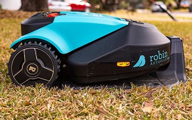 Mobile robot performing lawn care