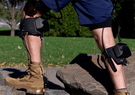 Person using an exosuit for outdoor activities.