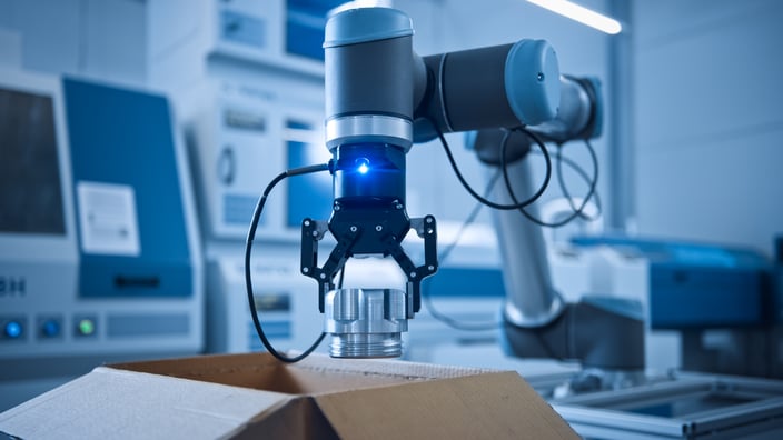 Gripper holding a metallic part with a collaborative robot