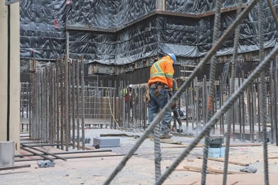 Rebar being tied together by hands